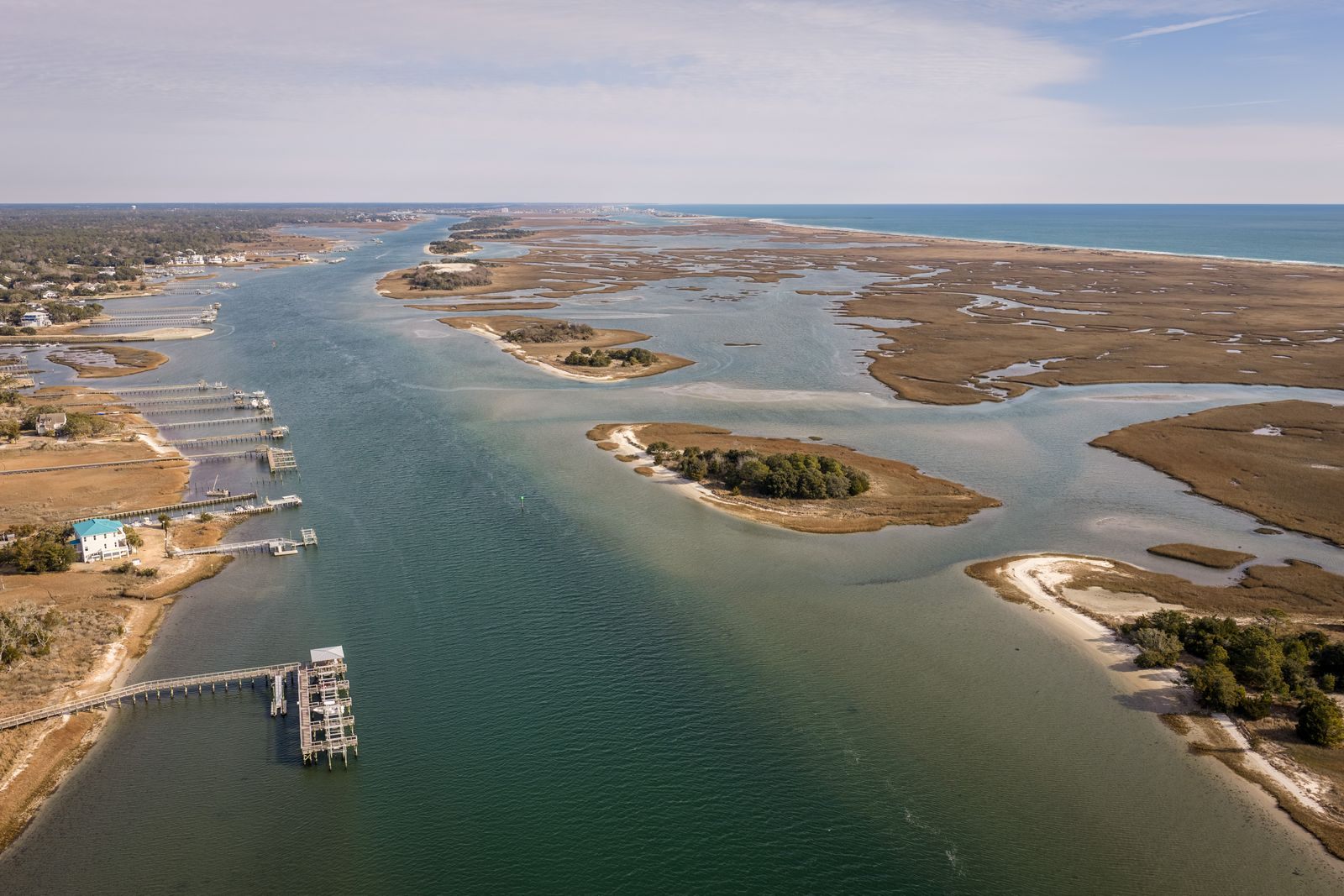 Aerial view of the Intracoastal Waterway winding through salt marsh near Wrightsville Beach, North Carolina